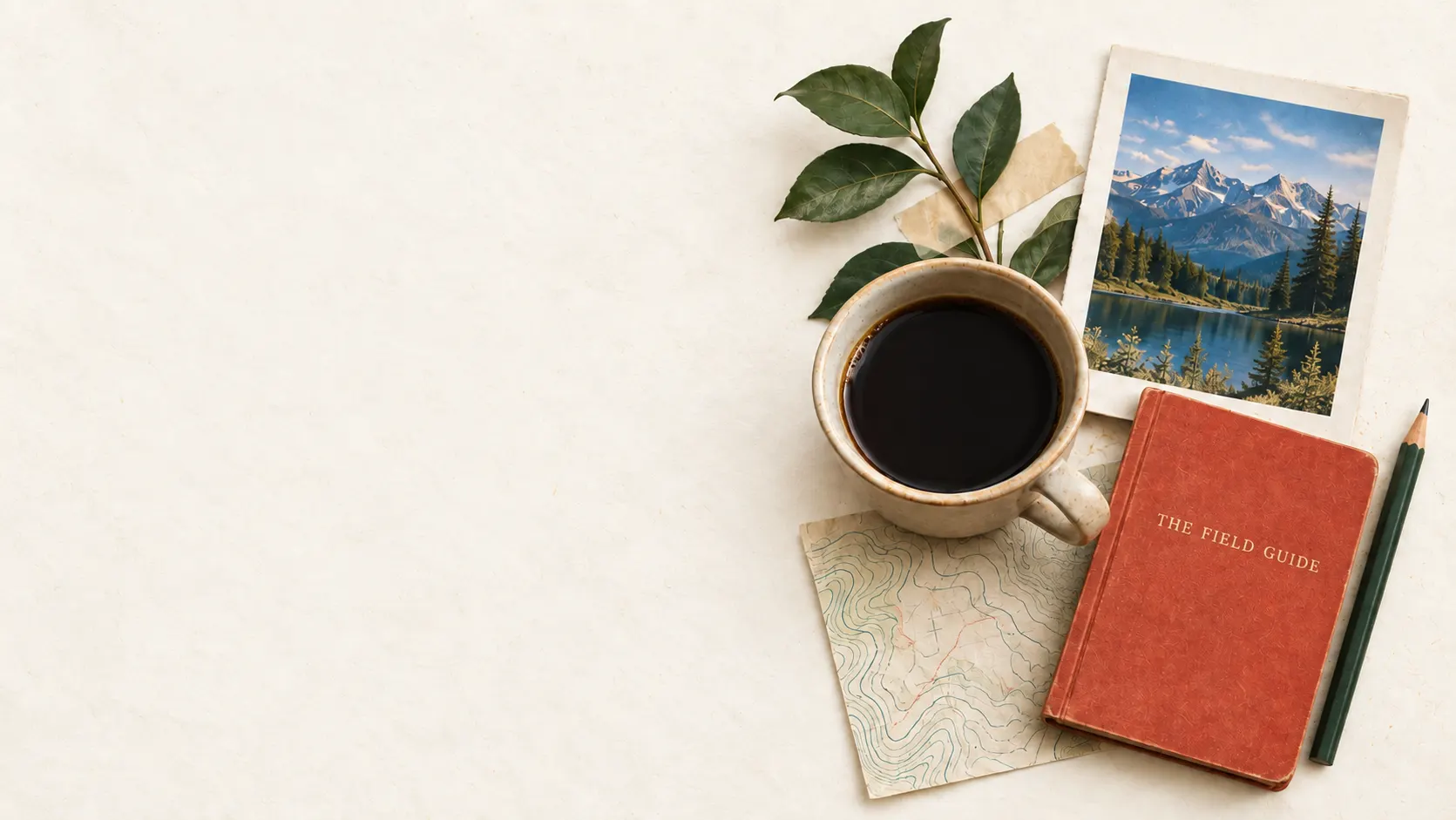 A terracotta notebook labelled The Field Guide, coffee, and a mountain photograph on a warm paper desk